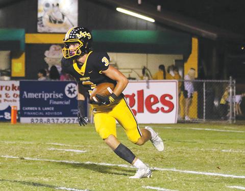 Cannon Crompton/sports@cherokeescout.com Ryan Payne returns a kick during Murphy’s game against the Greenville Hurricanes on Sept. 20.