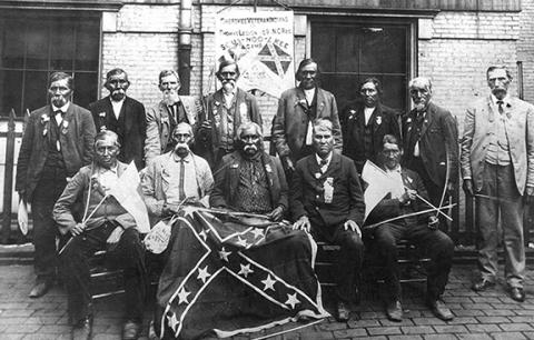 Veterans of the Thomas Legion, including several Cherokee members with their battle flag, taken at a 1903 Confederate reunion in New Orleans.