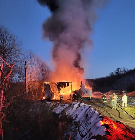 Robert Ward/Contributing Photographer The smoldering remains of a large workshop that burned down on Jan. 14 at the Cherokee County Landfill off of U.S. 19/74 in Marble near the Valley River.