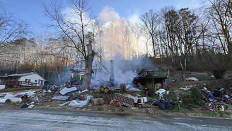 Randy Foster/editor@cherokeescout.com Remains of a house at 126 Regal St. in Murphy smolder on the morning of Jan. 7, about 10 hours after fire broke out.