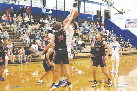 Cannon Crompton/sports@cherokeescout.com Braxton Rickett of Andrews denies Dalton Kester of Hiwassee Dam in their game Thursday night. 