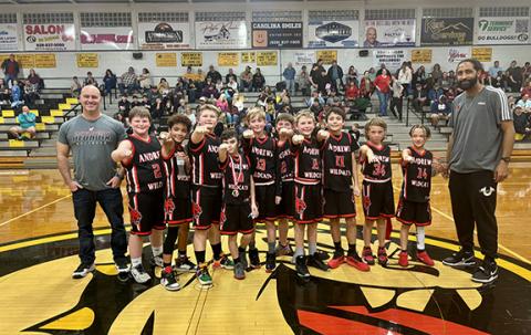 Erika Luther/Contributing Photographer  The Andrews Termite Boys basketball team won the Christmas tournament hosted at Murphy High School to continue its undefeated season. From left are coach Trevor Waldroup, Aiden Bryant, Lincoln Greene, Casen Luther, Jackson Waldroup, Jordan Garrett, Ian Sargent, Cooper Vaught, Connor Helton, Nicco Baxter, Keyon Blackwell and coach Keevon Allen. Not pictured are Jude Daugherty, Case Tucker, Grayson Palmer, Jaxson Chance and Landan Adams.