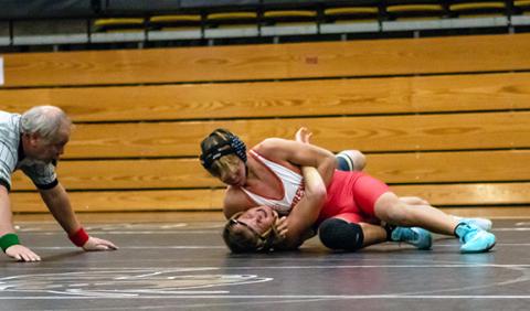 Cannon Crompton/sports@cherokeescout.com Andrews wrestler Chase Beasley fights for the pin against his Hayesville opponent on Dec. 3.