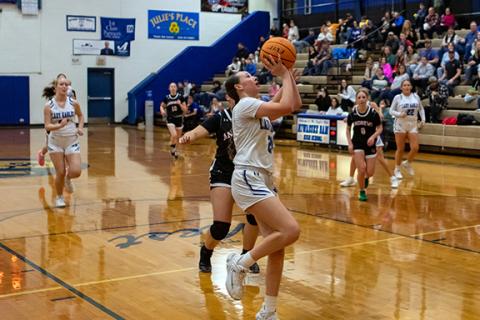 Cannon Crompton/sports@cherokeescout.com Abby Harris of Hiwassee Dam drives to the hoop to make a layup against Andrews on Thursday. 