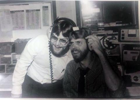J.R. Carroll (left) and Brian Hallgren share a laugh in the studio of WCVP-AM 600 in Murphy in 1981.