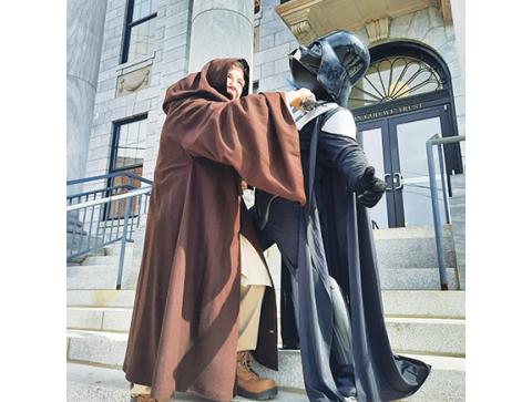 Anngee Quinones-Belian/Staff Correspondent A battle on the steps of the Cherokee County Courthouse in downtown Murphy between Obi-Wan Kenobi (Kevin Hoeschen) and Darth Vader (Greg Rosenberger) took place on the afternoon of Feb. 18, and all for a good cause. The Star Wars rivals are scheduled to be arrested from 11:30 a.m. to 1:30 p.m. Friday, March 7, as part of the Murphy club’s annual Rotary Jail & Bail fundraiser, which supports the Rotary Reads program in Cherokee County Schools. If they are unable to 