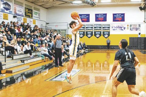 Cannon Crompton/sports@cherokeescout.com Cale Harger of Murphy shoots a jump shot three-pointer against Robbinsville on Jan. 28.
