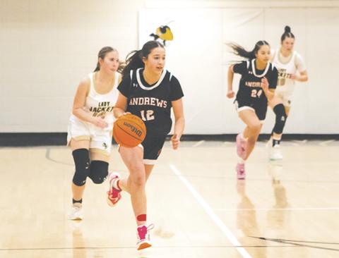 Cannon Crompton/sports@cherokeescout.com Andrews’ Drea Cutshaw drives down the court against Hayesville on Feb. 18.
