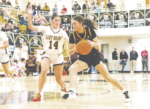 Cannon Crompton/sports@cherokeescout.com Lady Bulldog Ella Howard drives to the basket against Cherokee on Feb. 18.