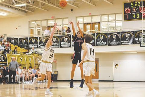 Cannon Crompton/sports@cherokeescout.com Gabe Clark of Andrews shoots a 3-pointer against Hayesville on Jan. 21.