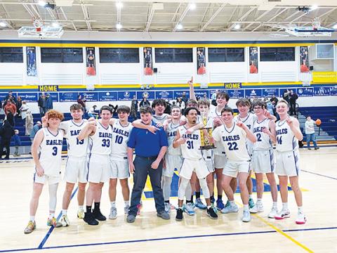 Dana Dockery/Contributing Photographer The Hiwassee Dam boys varsity basketball team after winning the Little Smoky Mountain Conference on Thursday. From left are Abel Penland, Isaiah Crisp, Pace Ware, Jimmy Kelley, manager Braiden Trow, Aidan Bennett, Jack Raper, Darius Pope, Avery Taylor, Jonah Dockery, Dalton Kester, Brock Hyde, Aiden Weaver, Braiden Ledford and Luke Harbin.