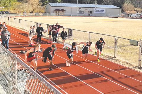 Reagan Lindsay/Contributing Photographer Isaac Patrick (left) of Andrews competes in the 55-meter dash where he placed 3rd on Jan. 29. 