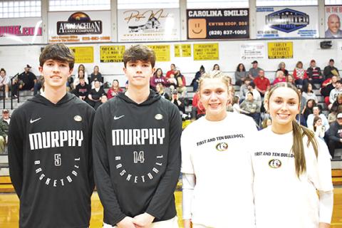 Mary Lynn Hulsey/Staff Correspondent The Murphy High School seniors were honored before their game Thursday night against. From left are Bradey Golden, Connor Golden, Julia Dockery and Cayla Geer.