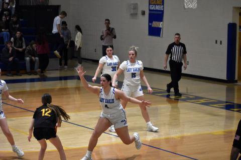 April McNabb/Contributing Photographer Hiwassee Dam’s Brinkley Payne, Olivia McNabb and Sky Taylor (from front to back) defend against Highlands on Thursday. 
