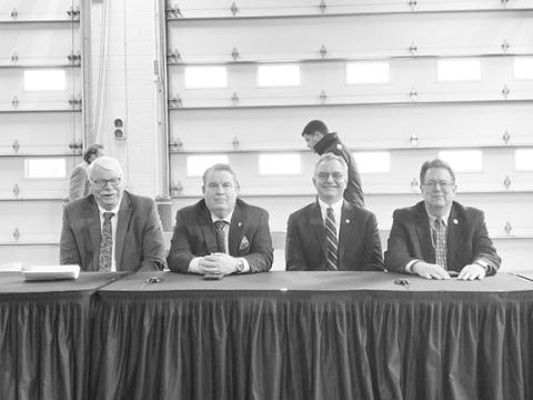 From left, N.C. Agriculture Commissioner Steve Troxler, N.C. Rep. Brendan Jones (R-Tabor City), N.C. Rep. Karl Gillespie (R-Franklin) and N.C. Sen. Kevin Corbin (R-Franklin) sit at a presidential roundtable in the Asheville Regional Airport on Jan. 24.