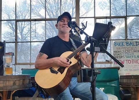 Anngee Quinones-Belian/Staff Correspondent Cooking up some tunes: Local favorite Bill Vespasian was the musical entertainment at Buck Bald Brewing in downtown Murphy on Feb. 15 during a chili cook-off to help raise money benefitting Nam Knights of America MC, Appalachian Chapter.