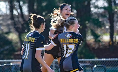 Murphy’s Leah Beebe (middle, 12) celebrates scoring the first goal of the game against Hayesville on March 17 along with teammates (from left) Kadence Walton, Brooklyn Johnson and Tina Bui. Cannon Crompton/sports@cherokeescout.com 