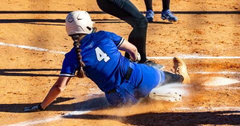 Brinkley Payne of Hiwassee Dam slides safely into home plate for one of her three runs scored on March 18 against Hayesville. Cannon Crompton/sports@cherokeescout.com 