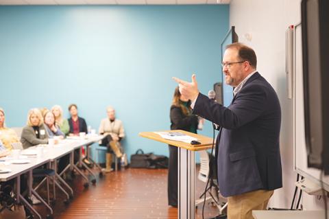 Josh Carpenter of the Mountain West Partnership, a former Cherokee County economic development director, speaks during the business roundtable Thursday at Tri-County Community College.