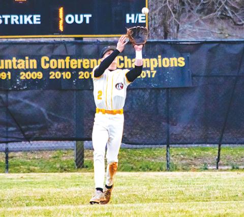 Cannon Crompton/sports@cherokeescout.com Adam Cook of Murphy catches a fly ball in center field during their game against North Buncombe on Friday.