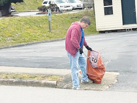 The Rotary Club of Murphy’s Saturday trash pickup event was successful, as 13 members helped clean up downtown streets. Above: Jim Gerke leaves no garbage behind. Below: Afterward, participants were treated to Crafted Dough Coffee & Donuts by Nancy Helms and Grape Creek Homemakers. Special thanks to chair Helms, Dan Valentino and all of the volunteers.