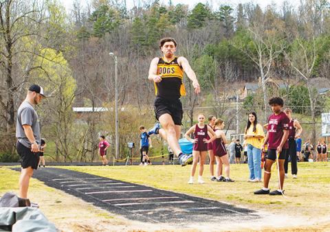Cannon Crompton/sports@cherokeescout.com Cale Harger of Murphy competes in the long jump at Murphy High School on April 2. 