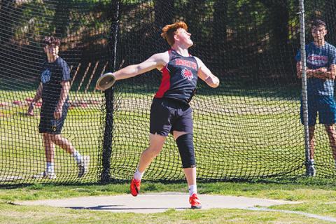 Cannon Crompton/sports@cherokeescout.com William Wood of Andrews is pictured in his school record-breaking discus throw of 155-foot, 10-inches at Murphy High School on April 16. 