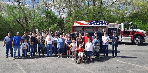 Anngee Quinones-Belian/Staff Correspondent  Members of the community came out to show support for 10-year-old Brayden Shiflett (sitting), who is struggling with several serious medical conditions, including Tetralogy of Fallot, severe scoliosis and complications from both. Saturday’s motorcycle ride included all types of vehicles. The group included bikers, law enforcement officers, firefighters, classic and antique car enthusiasts. Brayden said softly about the event in his name, “It’s all pretty cool. I’m