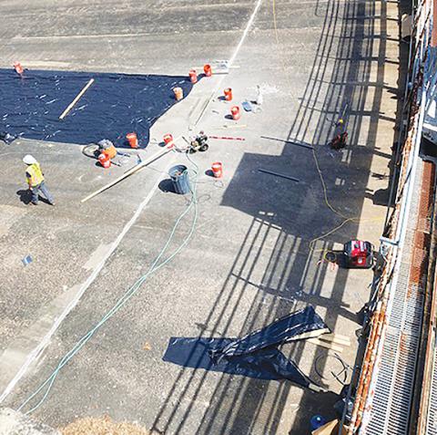 Marcia Barnes/Clay County Progress  Work to repair spillway joints at Chatuge Dam were ongoing March 28 during a Tennessee Valley Authority media event.
