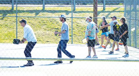 Randy Foster/editor@cherokeescout.com A pleasant spring morning brought a crowd out to the pickleball courts behind Murphy Health & Fitness on March 29. There was a line waiting for time on the courts.