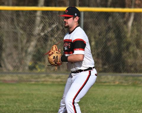 Photos by Bre Woodard/Staff Correspondent  Left: Ethan Sutton of Andrews gets ready to field a ball in their game against Hayesville on March 14. Right: Lauren Cochran of Andrews steps up to the plate in their game against Hayesville on March 14.