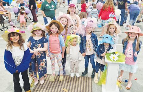  Rain and overcast skies didn’t stop folks from coming out to enjoy some family fun and a bite to eat on the afternoon of April 6. Easter bonnet contestants lined up to strut their stuff at the Hiwassee Dam Fire Department for the community’s annual Easter Extravaganza event. 