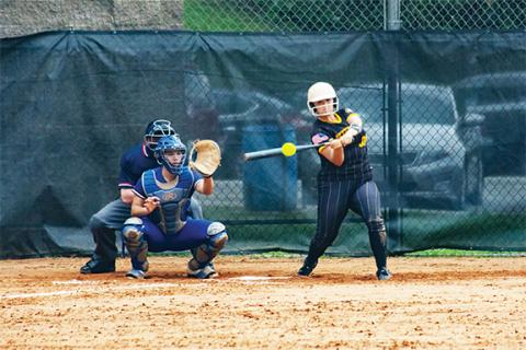 Cannon Crompton/sports@cherokeescout.com Piper Dalton of Murphy hits a single in the bottom of the seventh inning to score Emma Hensley to beat Hiwassee Dam on Thursday.