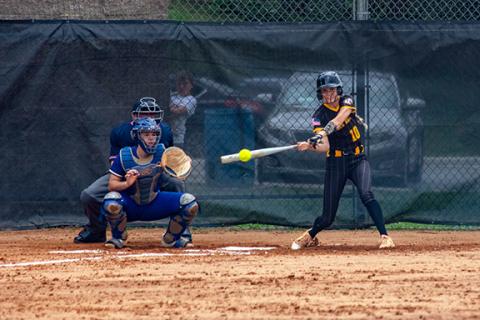 Cannon Crompton/sports@cherokeescout.com Julia Dockery of Murphy makes contact to get on base during the game against Hiwassee Dam on April 24. 