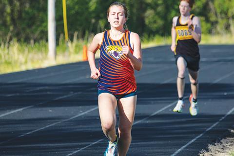 Cannon Crompton/sports@cherokeescout.com Fern Crayton of Tri-County Early College competes in distance running at Murphy High School on April 16.