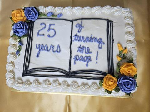 Jacqueline Hulse’s 25th anniversary celebration of employment with the Andrews Public Library featured a custom cake from Homespun Hobbies, which was given by her longtime co-worker, Kelly Bryant. Hulse received a plaque and was thanked profusely for her years of service by Nantahala Regional Library Director Franklin Shook.