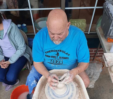 Potter Michael Lalone was busy molding clay into beautiful pieces of pottery art in downtown Murphy during the First Friday Art Walk. 