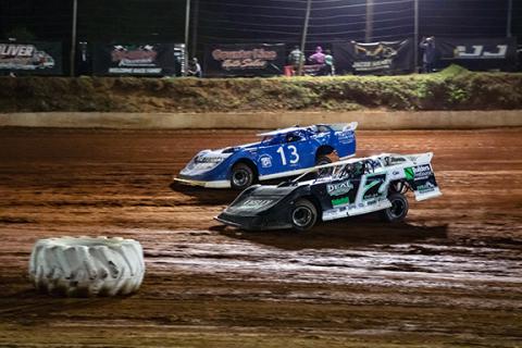 Cannon Crompton/sports@cherokeescout.com 604 Crate Late Model drivers Jacob McTaggart (13, top) of Blue Ridge, Ga., and Jason Deal (7, bottom) of Copperhill, Tenn., race their way around Tri-County Racetrack in Brasstown on April 18.