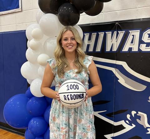 April McNabb/ Contributing Photographer Hiwassee Dam senior Olivia McNabb was surprised at the school’s athletics banquet on May 19, when she found out that she had reached the milestone of 1,000 rebounds in her high school basketball career.