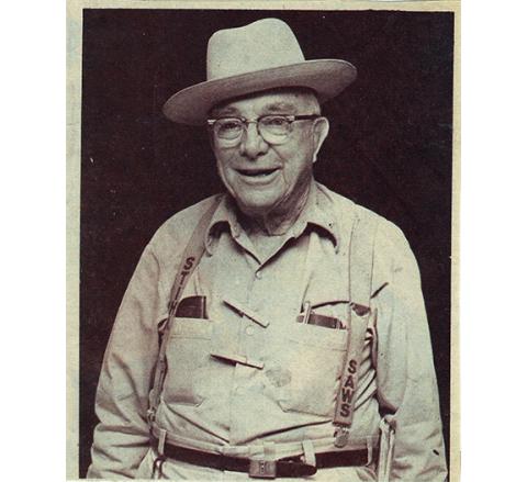 Bob Barker sporting his signature khaki attire and his Panama straw hat.