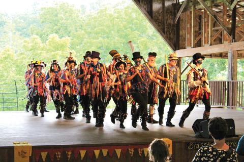 Stacy Van Buskirk/Staff Correspondent Dancers from the Dames Rocket Northwest Clog, Mud Border Morris and Sword Rapper Dancing lit up the stage at the Pie Palooza event Friday evening to raise funds for 26 dancers to go to England next month to grow and learn in traditional dances.