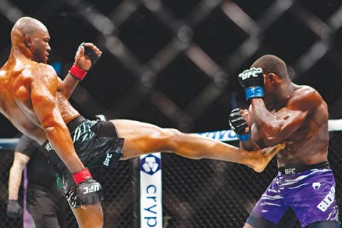Photos by Cannon Crompton/sports@cherokeescout.com Kamaru Usman (left) lands a body kick to Joaquin Buckley in the main event of Saturday’s UFC Fight Night in Atlanta.