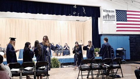 Nicole Wright/Staff Correspondent The seniors’ Silly String flew after the graduation ceremony ended at Nantahala High School’s Class of 2025 graduation Friday night.