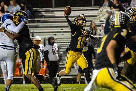 Cannon Crompton/sports@cherokeescout.com Murphy quarterback Brady Grant throws to an open receiver during last season’s first-round playoff game against Highland Tech on Nov. 15, 2024.