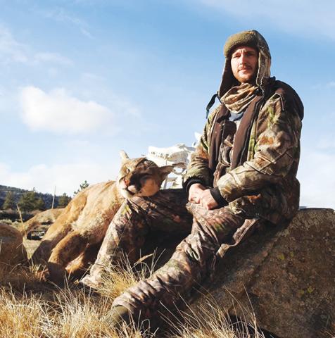 Seth Stallard of Hiwassee Dam on a hunting trip in Colorado in 2023, when his dogs treed three mountain lions in five days. He says he has been all over the hills of western North Carolina and never had an experience like he did out West. 
