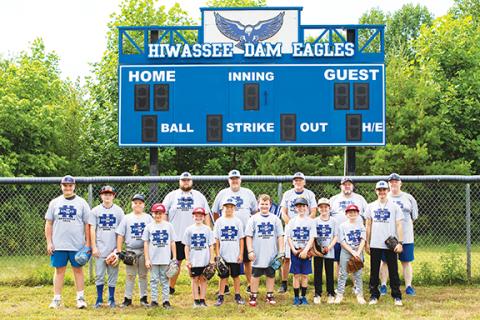 Cannon Crompton/sports@cherokeescout.com Hiwassee Dam youth, as well as Eagles varsity baseball coaches and players, gathered for the team’s annual youth camp Thursday and Friday. Pictured are those in attendance at the camp. 