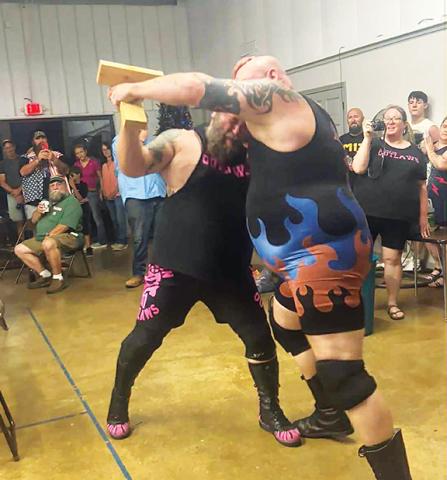 Cindy Ray/Contributing Photographer Killshot looks to land big hits outside of the ring against Cyrus on Saturday night.