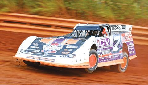 Dean Curlee/Contributing Photographer Zach Sise drives his way to the win in the Topless Outlaws Late Model Series on Saturday night at Tri-County Racetrack in Brasstown. 