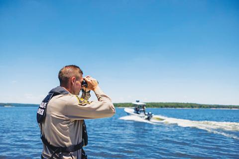 N.C. Wildlife Resources Commission A N.C. Wildlife Resources Commission law enforcement officer keeps a watchful eye over the waters of western North Carolina.