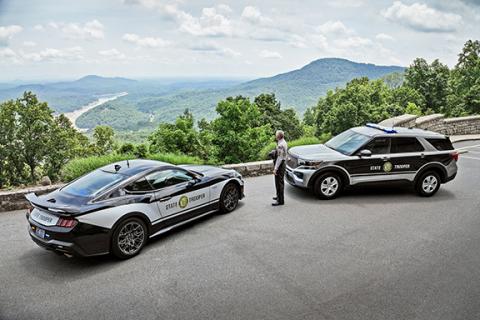 The American Association of State Troopers has kicked off the 2025 America’s Best-Looking Cruiser Contest, and the N.C. Highway Patrol will be represented again this year with a special photo submission in honor of western North Carolina. The contest started Monday and ends at 5 p.m. July 11. This year’s photo submission was taken atop the observation deck at Chimney Rock State Park in Rutherford County. The patrol’s Ford Mustang and Ford Police Interceptor Utility are displayed as First Sgt. J. E. Reid, di